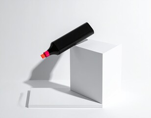 Obraz premium Black marker with orange tip on white cubes