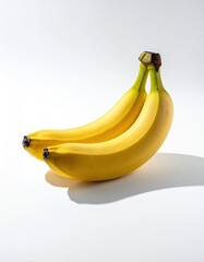 Two ripe bananas, slightly angled, against a white background