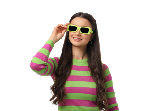 Smiling woman adjusts sunglasses in vibrant outfit, isolated, PNG