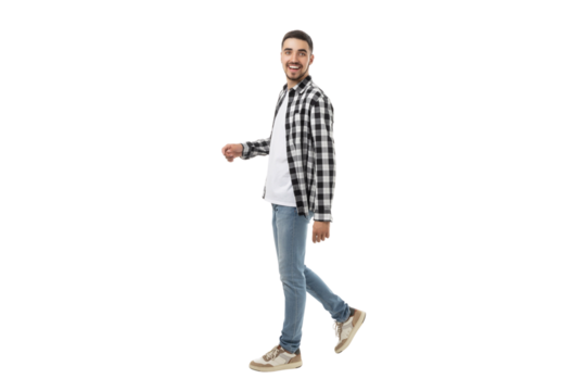 Smiling young man in casual attire walking forward, isolated, PNG