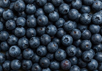 A vibrant close-up of a generous pile of fresh, ripe blueberries, showcasing their natural beauty, rich color, and healthy appeal ,dark blue ,breakfast ,wholesome