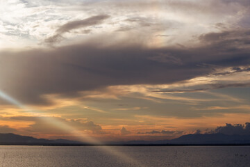 Scenic Sunset Over the Water with Sun Rays