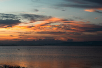 Fototapeta premium Scenic View of Lake at Sunset