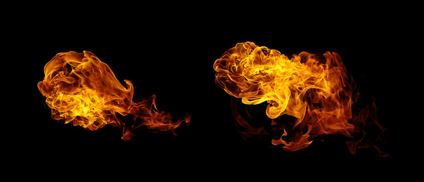 Bright orange flames isolated on a black background showing intense fire motion, perfect for visual effects, hot energy concepts, and dramatic design or advertising scenes.