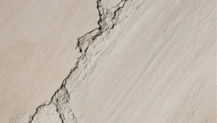 Close-up view of a cracked wall surface with detailed texture.