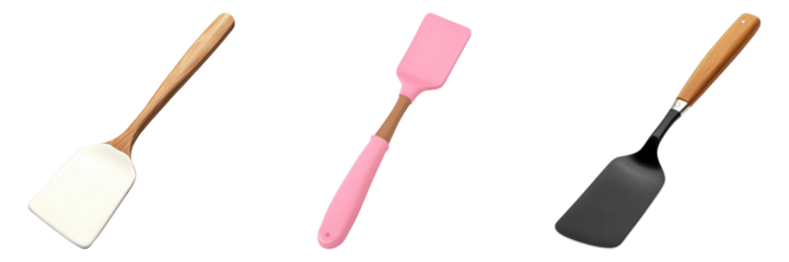 Close-up of three kitchen spatula of different colors and handle designs. A useful kitchenware equipment. 