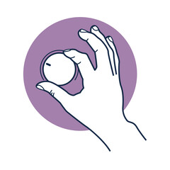 White hand holding a small round object isolated on transparent background