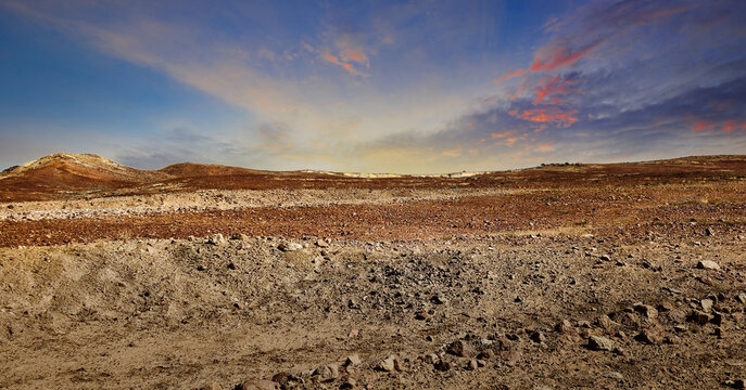 Scenic desert landscape with cloudy sunset sky - Powered by Adobe