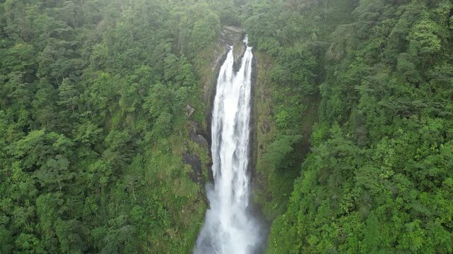 Aerial close-up view of Ayil Waterfall surrounded by tropical rainforest in Barbilla National Park, Limón province, Costa Rica