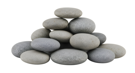 Smooth grey spa stones piled into a cairn pyramid isolated on a white background