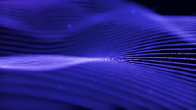 Abstract digital wave flowing in deep blue, with shimmering particles on a dark background, usable for tech themes