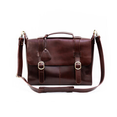 Beautiful dark brown vintage style leather bag on white background