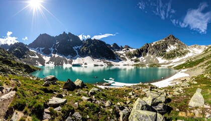 Obraz premium Stunning Mountain Lake Panorama on a Clear Sunny Day with Turquoise Water and Snow Capped Peaks