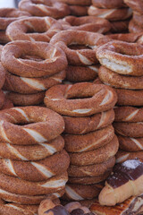 Freshly baked turkish simit stacked in a bakery