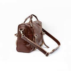 Beautiful dark brown leather bag for women on white background
