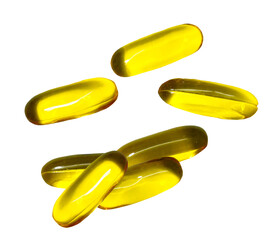 scattered arrangement of six vibrant yellow soft gel capsules, likely containing essential fatty acids or vitamin e, photographed against a stark transparent background.