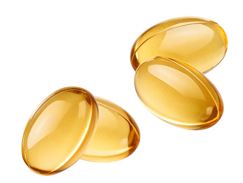 three glistening golden yellow softgel capsules, typically used for fish oil or essential fatty acid supplements, isolated against a dark backdrop.