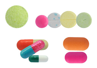 studio photograph featuring a structured pattern created by diverse, multicolored pharmaceutical pills and capsules against a dark background.