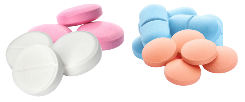 photograph showcasing a large variety of colorful pills and tablets, including white, pink, blue, and orange, mixed together against black.