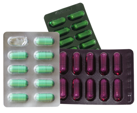 photograph showcasing three distinct types of large herbal or pharmaceutical capsules sealed inside colorful blister packaging isolated on a pure transparent background.