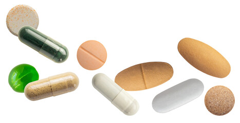 photograph of a horizontal arrangement of diverse health supplements and prescription pills, including capsules and various shaped tablets, dramatically isolated on black.