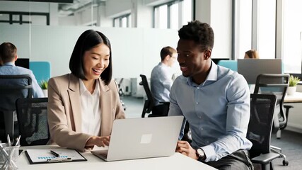 Business Couple Collaborating on Laptops in Cozy Workspace, Highlighting Power of Partnership in Digital Age, Perfect for Depicting Harmonious Working Relationship or Benefits of Collaboration. - Powered by Adobe