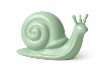 Green ceramic snail figurine creating a cute decorative object
