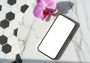 Top View of Mobile Phone with Blank White Screen on Marble Surface with Pink Orchid Flower Accent Hexagon Tile Background