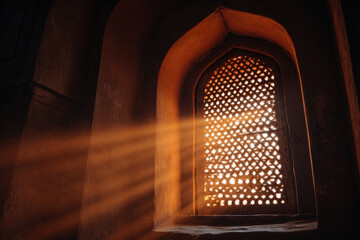 Sunlit carved stone arch window with geometric lattice casting warm rays and dust motes into ancient interior, creating serene atmospheric light and textured shadow patterns