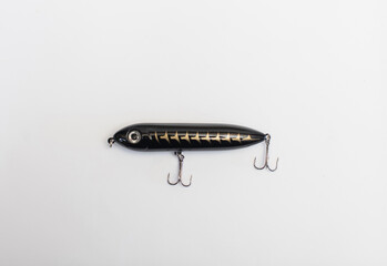 Metal fishing lure on white background