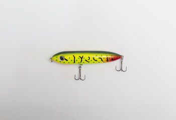 Metal fishing lure on white background