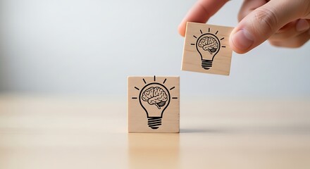 Synergy of ideas Human hand connects brain-lightbulb blocks, sparking creativity and growth