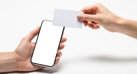 Hands holding smartphone and blank card for online transactions.