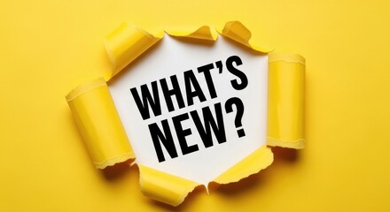What's New? Message Revealed in Torn Yellow Paper Hole