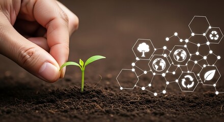 A human hand plants a small green sprout in the earth, symbolizing sustainable business growth, environmental technology, and a green future
