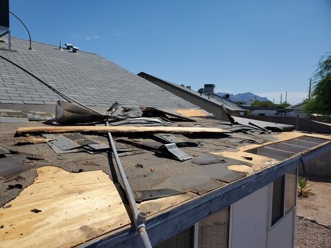 Damaged Roofing Material on Single Family Home, Roof Replacement