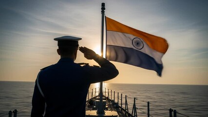 Silhouette of Indian Navy Officer Saluting the Flag on a Ship Deck at Sunset, Commemorating Navy Day