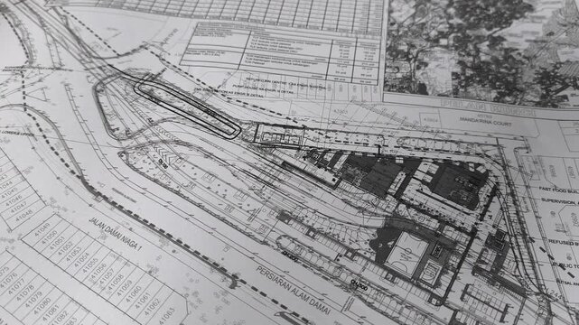 Close-up view of an A1 construction drawing. This large-format blueprint on white paper contains crucial technical details. It's used by site personnel for accurate building construction and execution