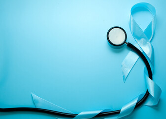 Healthcare and medical concept, Stethoscope and blood glucose meter sets on blue background, World Diabetes day, 14 November.