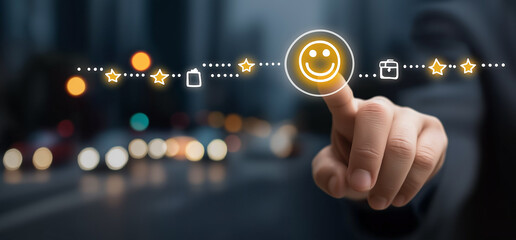Customer selects happy face icon on a star rating scale with blurred city lights background