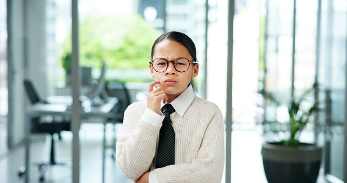 Naklejki Business girl, portrait and kid thinking with decision for company play or junior internship. Idea, child or pretend intern with glasses or plan for choice, costume or problem solving in workplace
