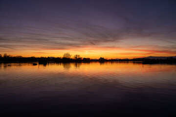 Beautiful sunset at Lake Ptuj. Wonderful autumn evening.