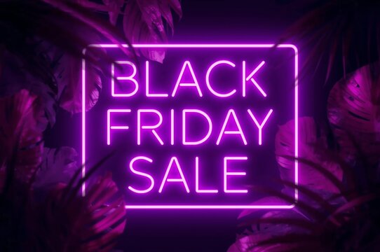 Vibrant neon pink glowing sign displaying black friday sale text surrounded by dark moody foliage and tropical leaves - Powered by Adobe
