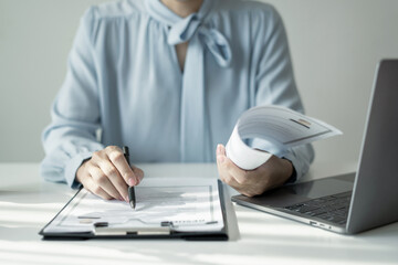 Business woman employer holding resume hiring recruit looking cv resume to hire candidates,...