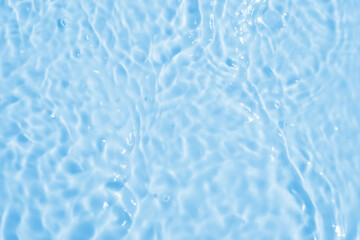 Abstract transparent water shadow surface texture natural ripple on blue background