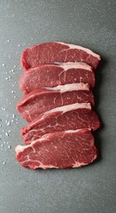 Fresh uncooked veal cuts displayed on a clean surface, ready for culinary preparation. Ideal for recipes requiring premium meat ,cuisine ,delicate ,protein