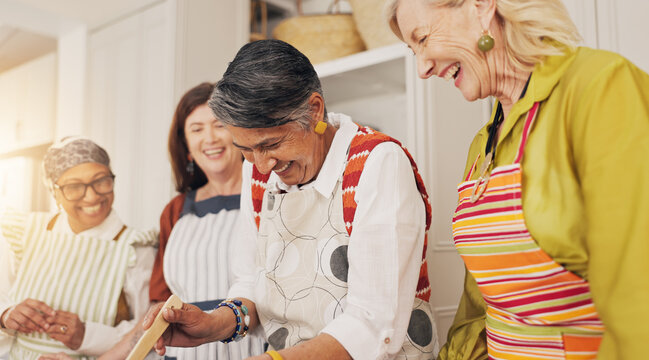 Cooking class, happy and mature women in kitchen for bonding, chef skills and culinary lesson. Laugh, social reunion and senior friends with ingredients for learning recipes, cuisine and meal in home