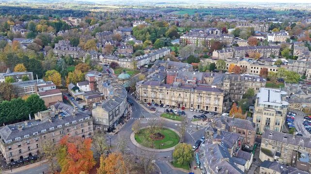 Montpellier Quarter aerial shows Royal Pump Room, landmark roundabout, elegant terraces, residential avenues, and rich autumn foliage in Harrogate centre