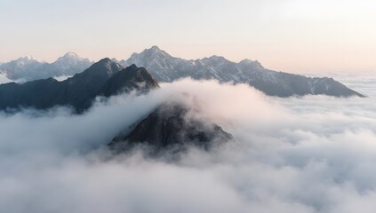 A mountainous landscape with clouds, emphasizing nature's majesty, tranquility, and scenic beauty.