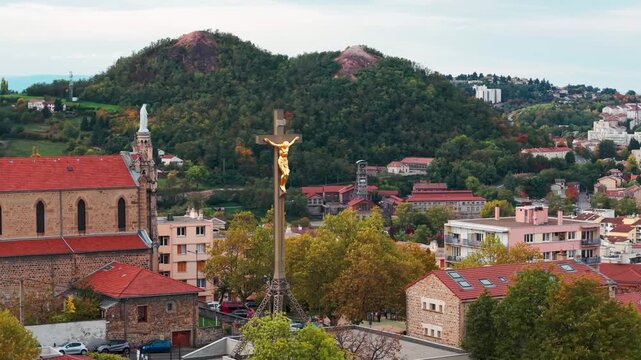 Aerial shot over the Colline des peres in Saint Etienne city with the puit couriot and the crassiers in the background, Loire departement, Auvergne Rhone Alpes region, France